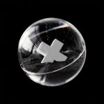 Ashes contained in a plastic ball.